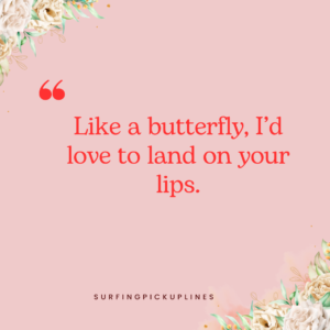 The image shows a light pink background with soft floral decorations in the corners. The text in red, bold font reads:
"Like a butterfly, I'd love to land on your lips."
Below the quote, in small black font, it says "SURFINGPICKUPLINES". The design gives a light and romantic feel, with the flowers adding a soft touch to the flirty message.